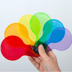 A hand holding a set of six translucent color plastic paddles in various colors.