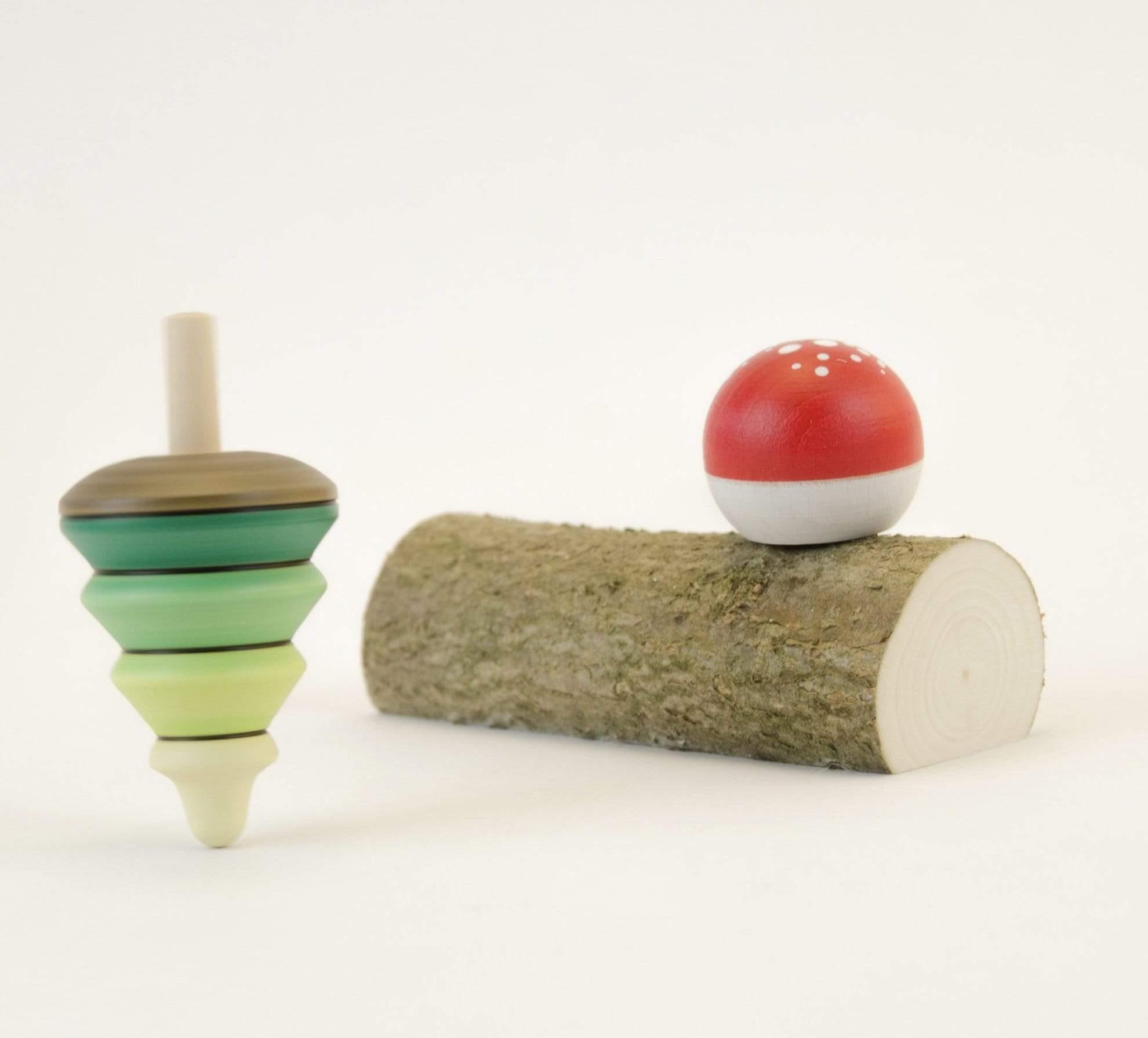 The Curated Parcel - Mader // Tree Spinning Top & Fly Agaric Turn Top on Branch