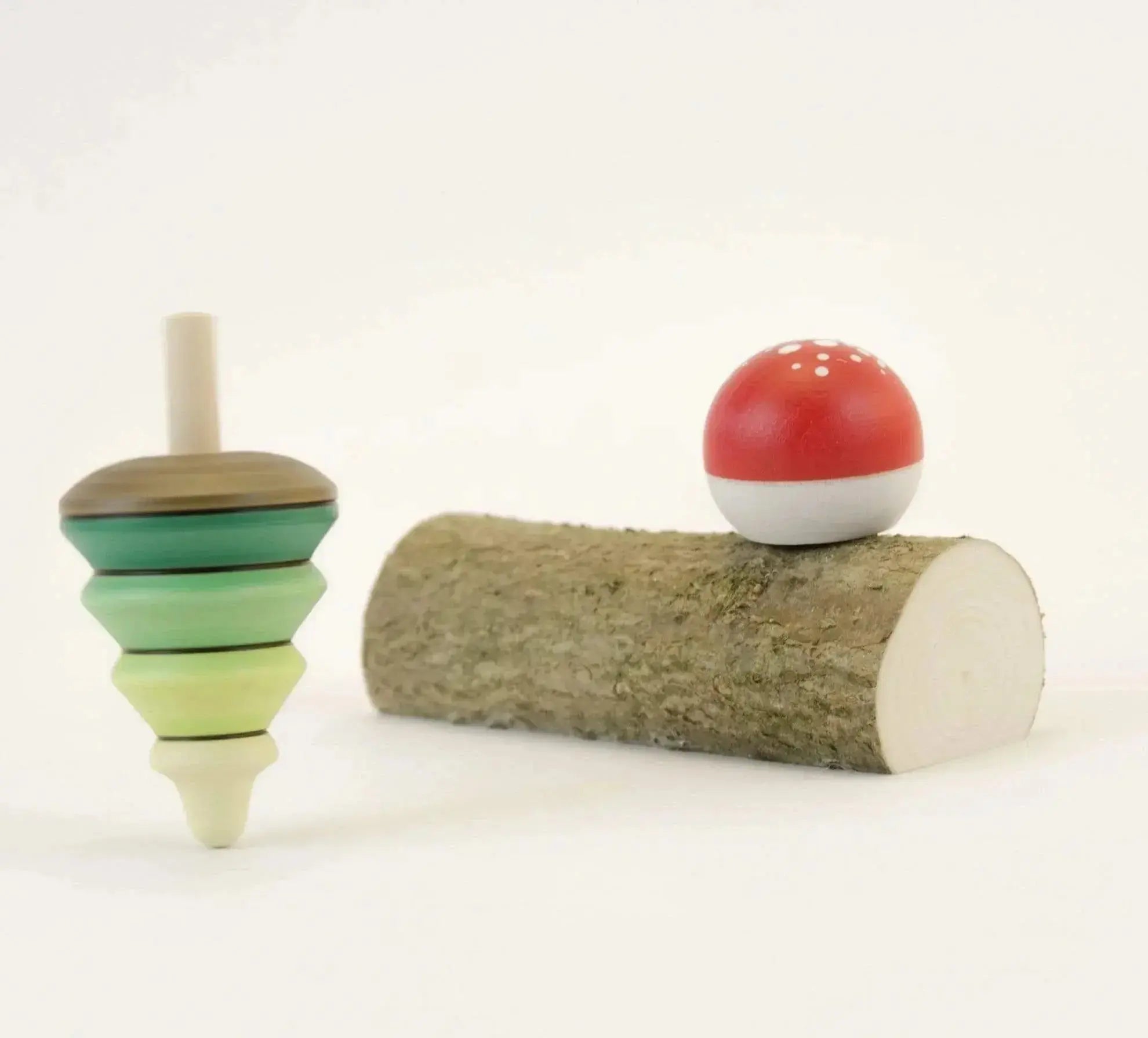 The Curated Parcel - Mader // Tree Spinning Top & Fly Agaric Turn Top on Branch