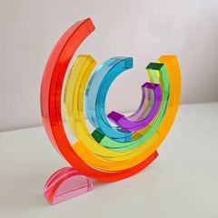 Lucite rainbow stacking arches — translucent acrylic, 7 pieces