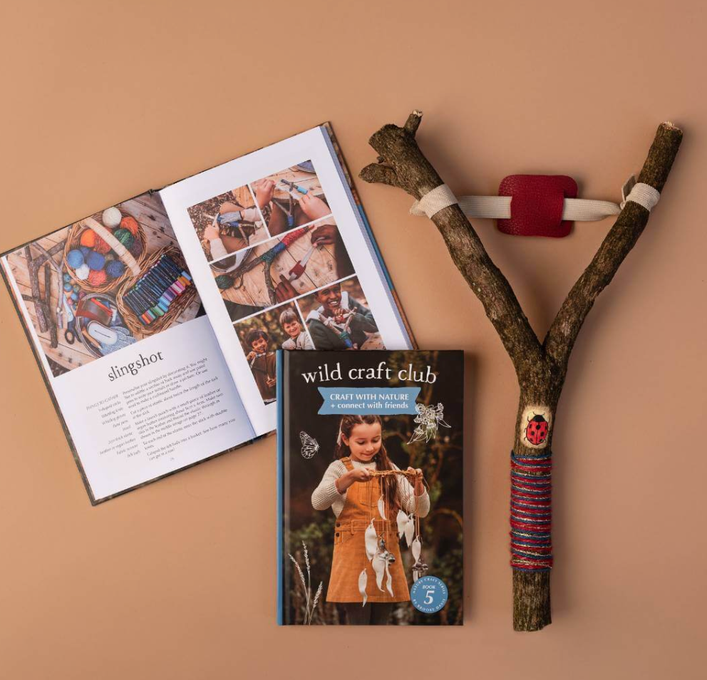 Children making leaf crowns and nature art from the Wild Craft Club book
