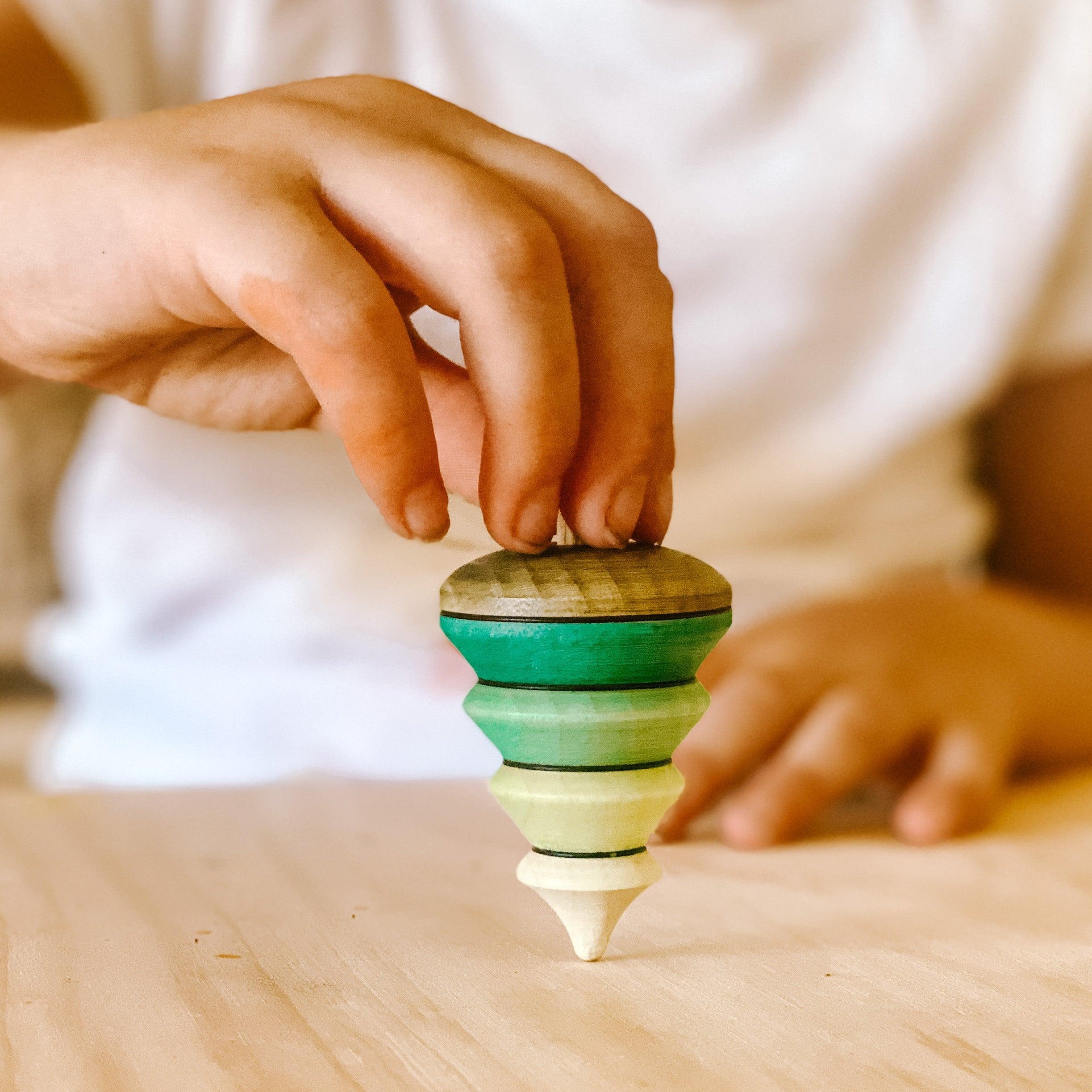 The Curated Parcel - Mader // Tree Spinning Top on Branch 